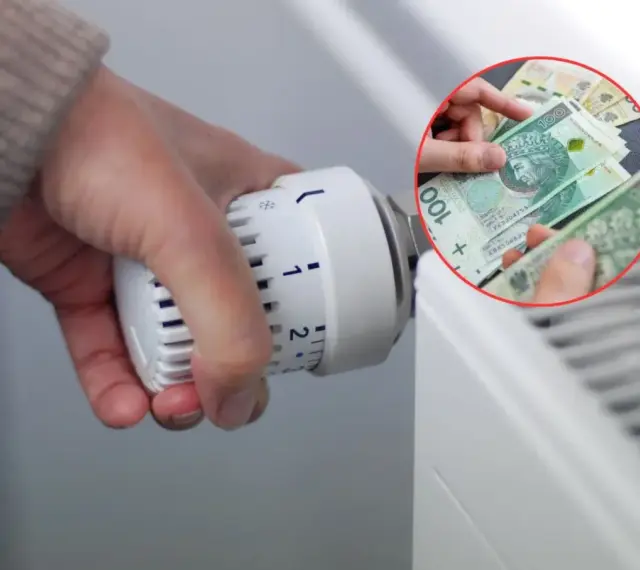 Ręka reguluje termostat grzejnika, a w tle widać polskie banknoty. To symbol oszczędzania na ogrzewaniu, być może dzięki bonowi ciepłowniczy.